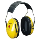 Yellow Peltor Optime over-ear hearing protection earmuffs with black cushions and an adjustable headband used for noise reduction in industrial settings.  iskiyafet.com İş Kıyafetleri ve iş elbiseleri